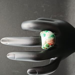 Size 7.5 green and white ring